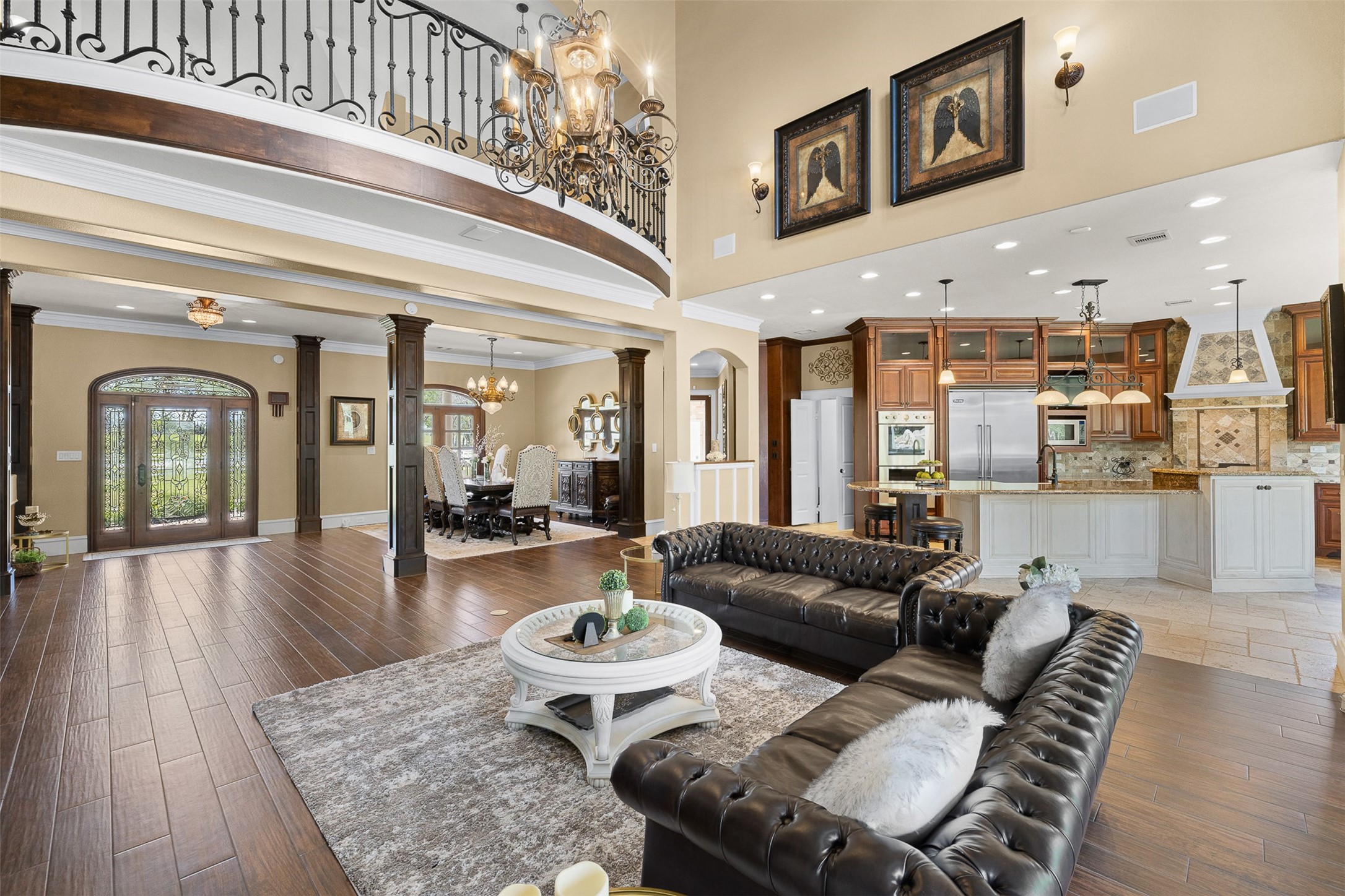 29500 Skymac Ranch Road Hempstead, TX 77445 - Photo 11 of 50 Designed for gathering, the main living spaces flow effortlessly from the living area to dining space and kitchen.