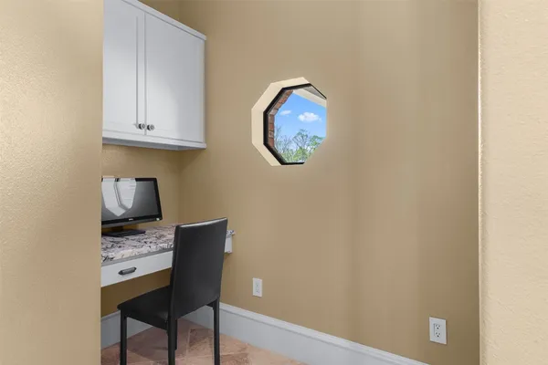 a view of an entryway wooden floor and door