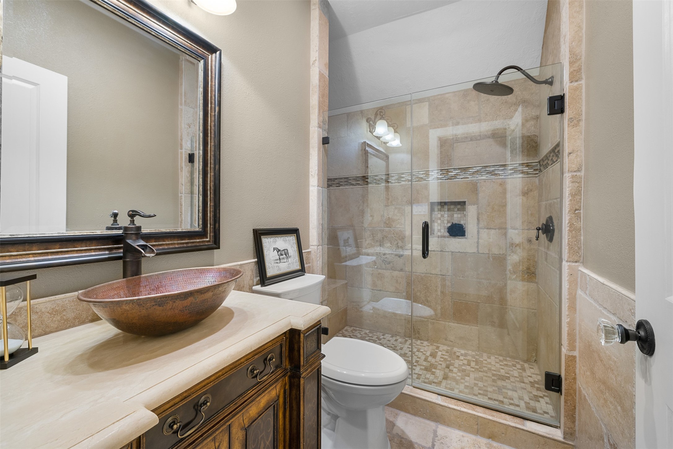 29500 Skymac Ranch Road Hempstead, TX 77445 - Photo 32 of 50 The en suite bath features a distinctive copper sink paired with a glass-enclosed walk-in shower, blending warmth with clean, refined finishes.