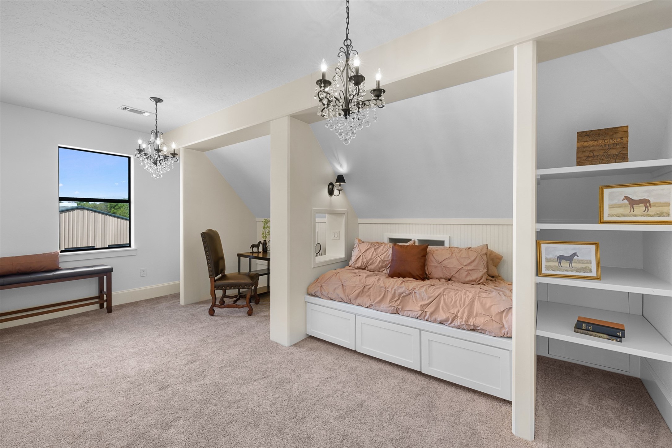 29500 Skymac Ranch Road Hempstead, TX 77445 - Photo 34 of 50 Custom built-ins define this versatile space, featuring integrated bookshelves and a thoughtfully designed layout that accommodates both a built-in bed and a dedicated desk area.