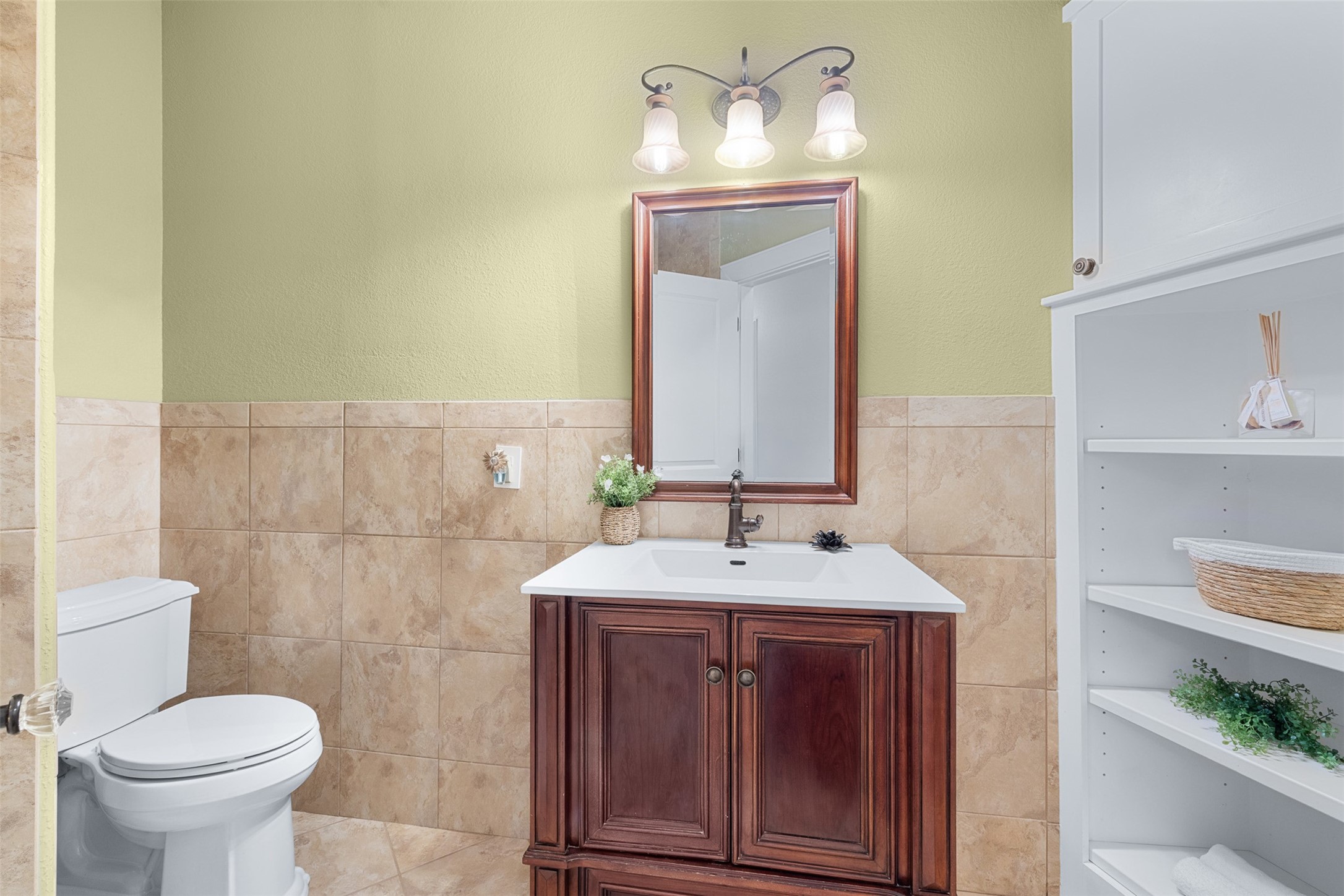 29500 Skymac Ranch Road Hempstead, TX 77445 - Photo 35 of 50 Designed to complement the private apartment-style wing, this bathroom includes built-in storage and a tub/shower combination, providing a practical and comfortable solution for guests and everyday use.