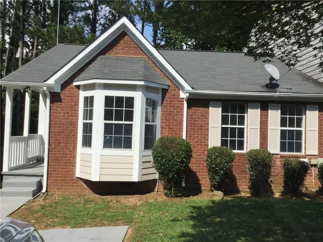 a view of outdoor space yard and front view of a house