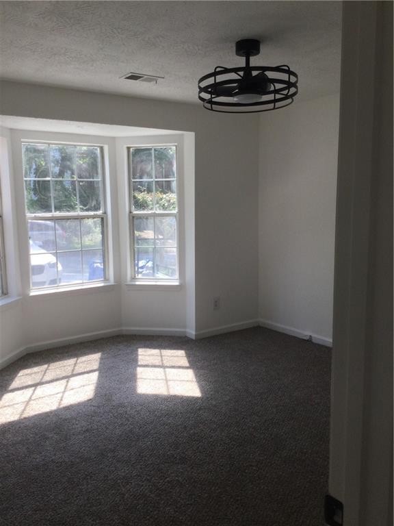 3186 Kingswood Glen Decatur, GA 30034 - Photo 15 of 23 a view of an empty room with a window