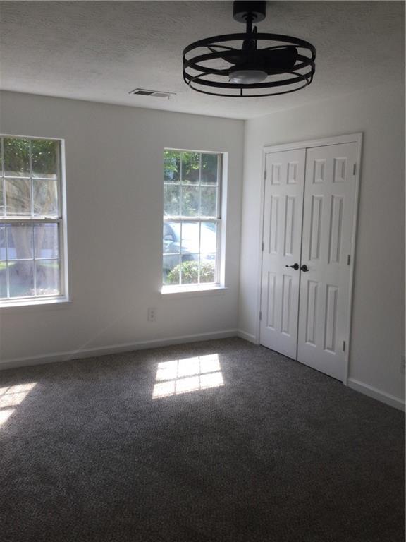 3186 Kingswood Glen Decatur, GA 30034 - Photo 16 of 23 a view of an empty room with windows