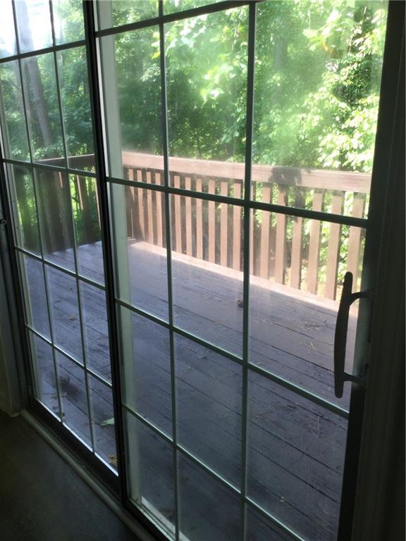 3186 Kingswood Glen Decatur, GA 30034 - Photo 23 of 23 a balcony with a glass door