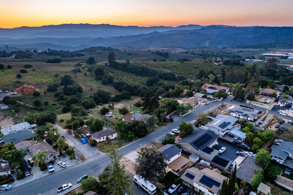 435 West Hawthorne Street Fallbrook, CA 92028 - Photo 6 of 42 an aerial view of residential house and sandy dunes