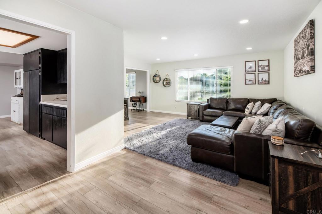 435 West Hawthorne Street Fallbrook, CA 92028 - Photo 7 of 42 a living room with furniture and a window
