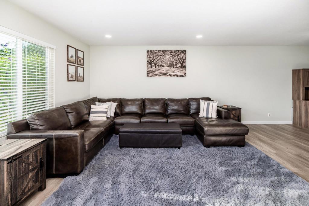 435 West Hawthorne Street Fallbrook, CA 92028 - Photo 10 of 42 a living room with furniture and a couch