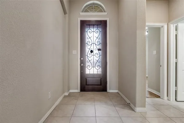 a view of an entryway with a door