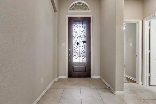 a view of an entryway with a door