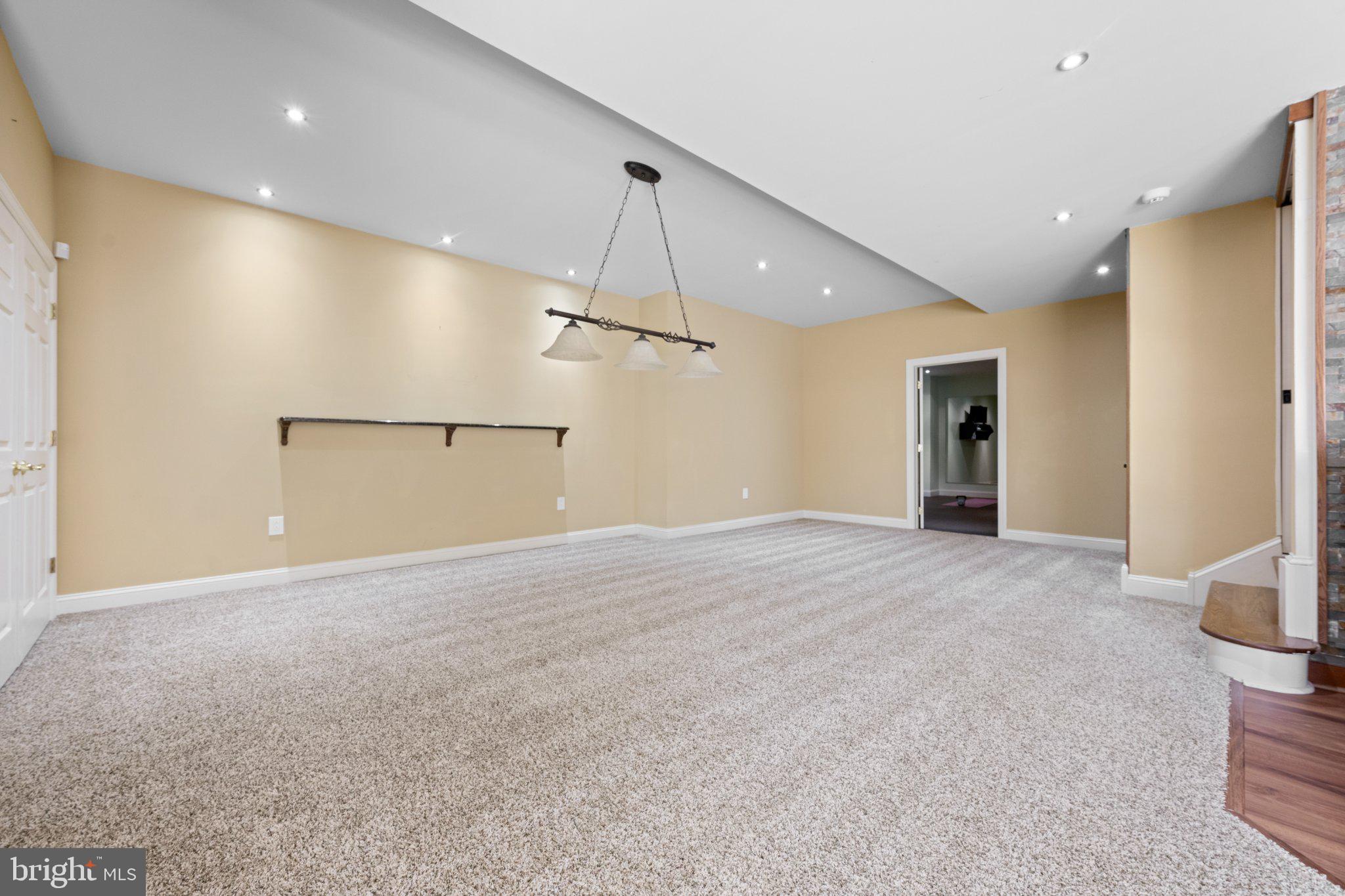 429 Church Road Devon, PA 19333 - Photo 45 of 55 Spacious room with modern lighting.