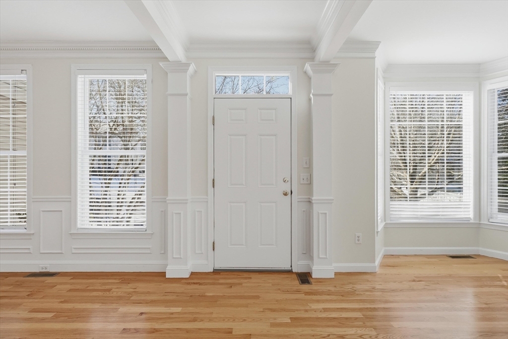 14 Amberville Road North Andover, MA 01845 - Photo 4 of 42 an empty room with wooden floor and windows