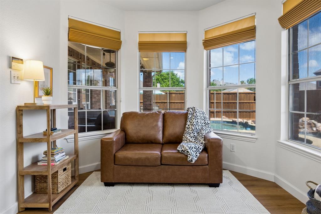 5315 Summit Knoll Trail Sachse, TX 75048 - Photo 20 of 40 a living room with furniture and a window