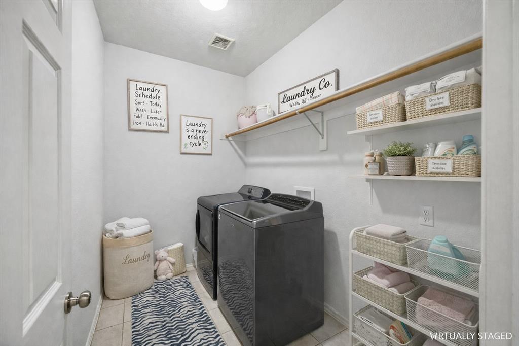 5315 Summit Knoll Trail Sachse, TX 75048 - Photo 25 of 40 a bathroom with a toilet and a shower curtain