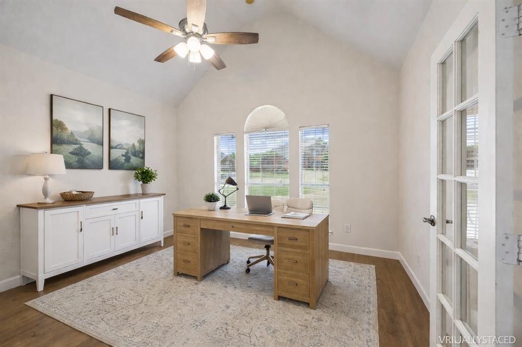 5315 Summit Knoll Trail Sachse, TX 75048 - Photo 8 of 40 a large white kitchen with a large window
