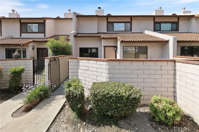 a view of a house with a garden