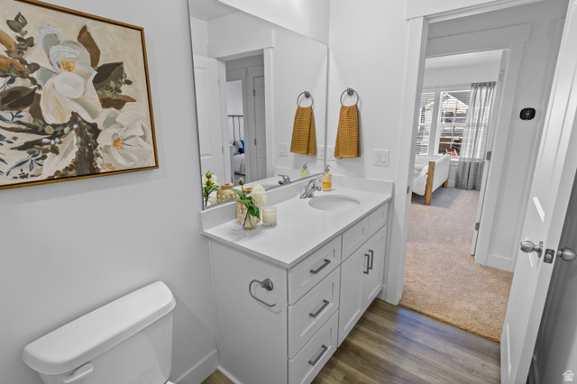 1264 West 500 South, Unit 320 Logan, UT 84321 - Photo 29 of 39 Bathroom vanity with white cabinetry, a white countertop, and a rectangular undermount sink