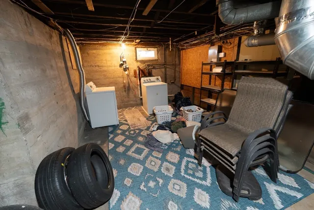 a view of a chairs and table in a room