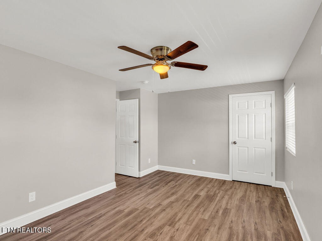155 Tacoma Road Oak Ridge, TN 37830 - Photo 30 of 33 a view of empty room with wooden floor
