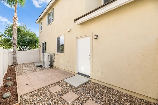 a view of a street with a building in the background