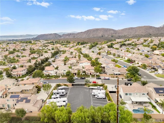 an aerial view of residential building with parking space