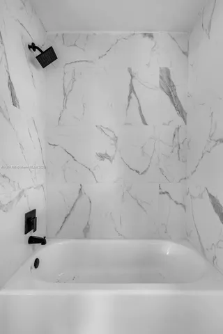 a bathroom with a bathtub