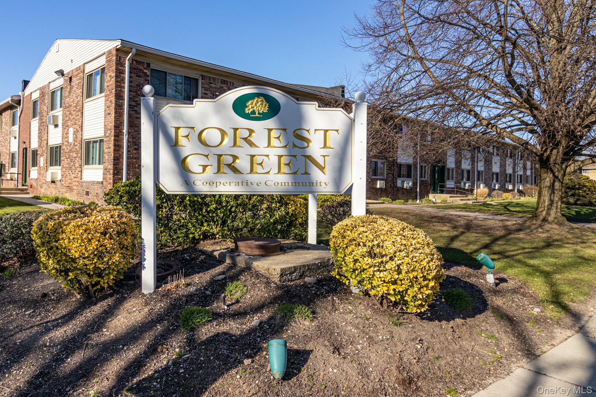 2449 Union Boulevard, Unit 36A Islip, NY 11751 - Photo 12 of 15 a sign on a street next to a building