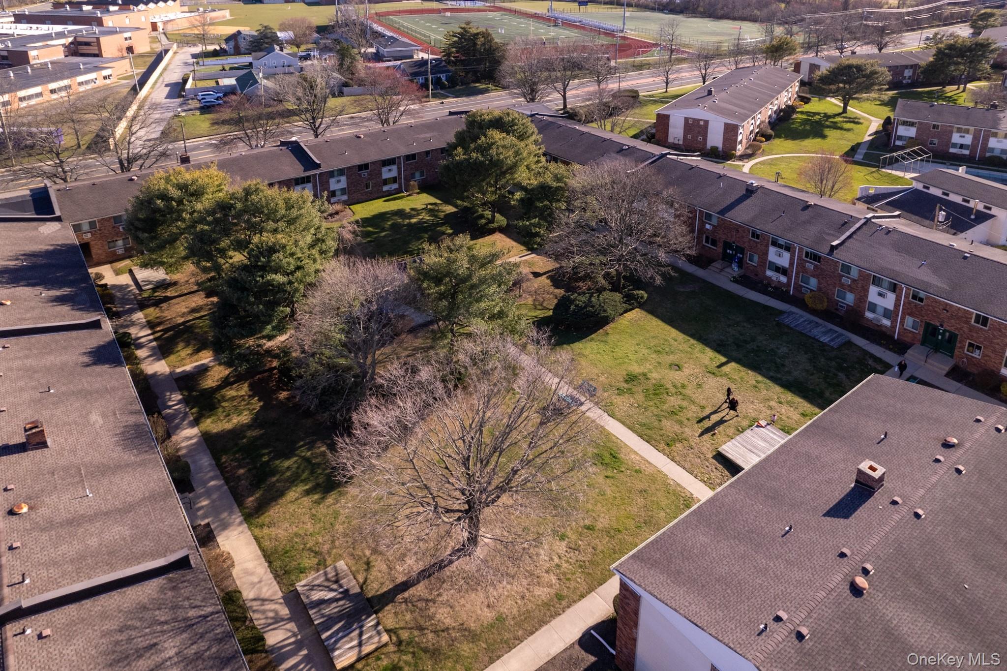 2449 Union Boulevard, Unit 36A Islip, NY 11751 - Photo 15 of 15 an aerial view of a house with a yard
