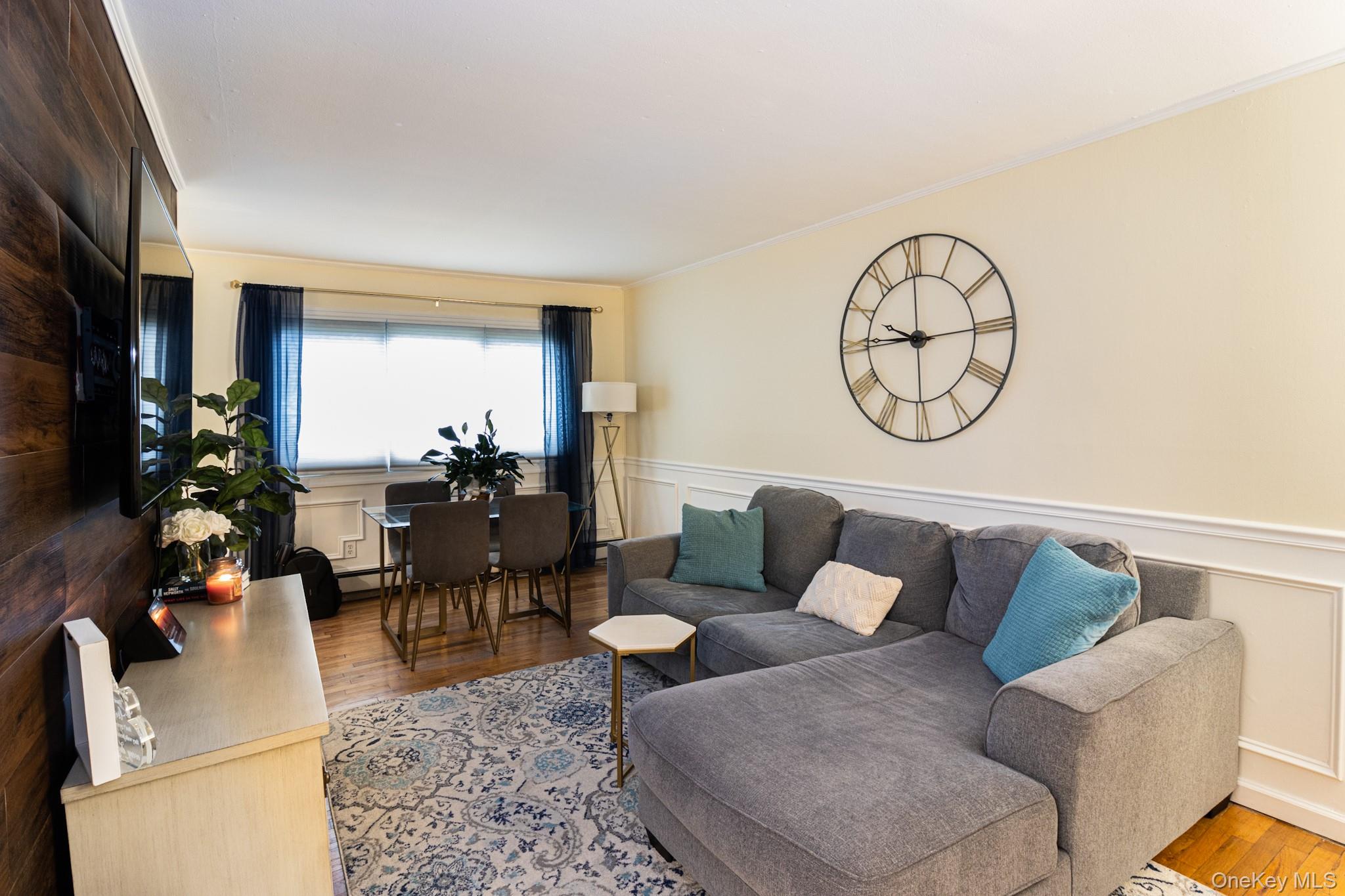 2449 Union Boulevard, Unit 36A Islip, NY 11751 - Photo 6 of 15 a living room with furniture and wooden floor