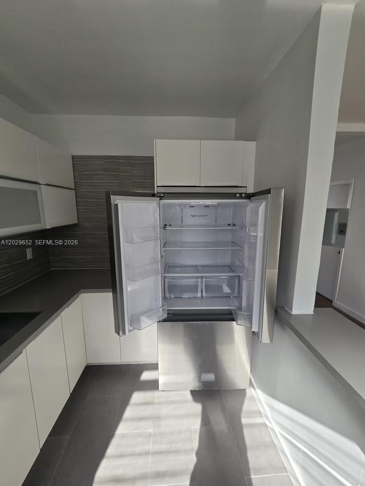 855 80th Street, Unit 4 Miami Beach, FL 33141 - Photo 12 of 16 a view of walk in closet