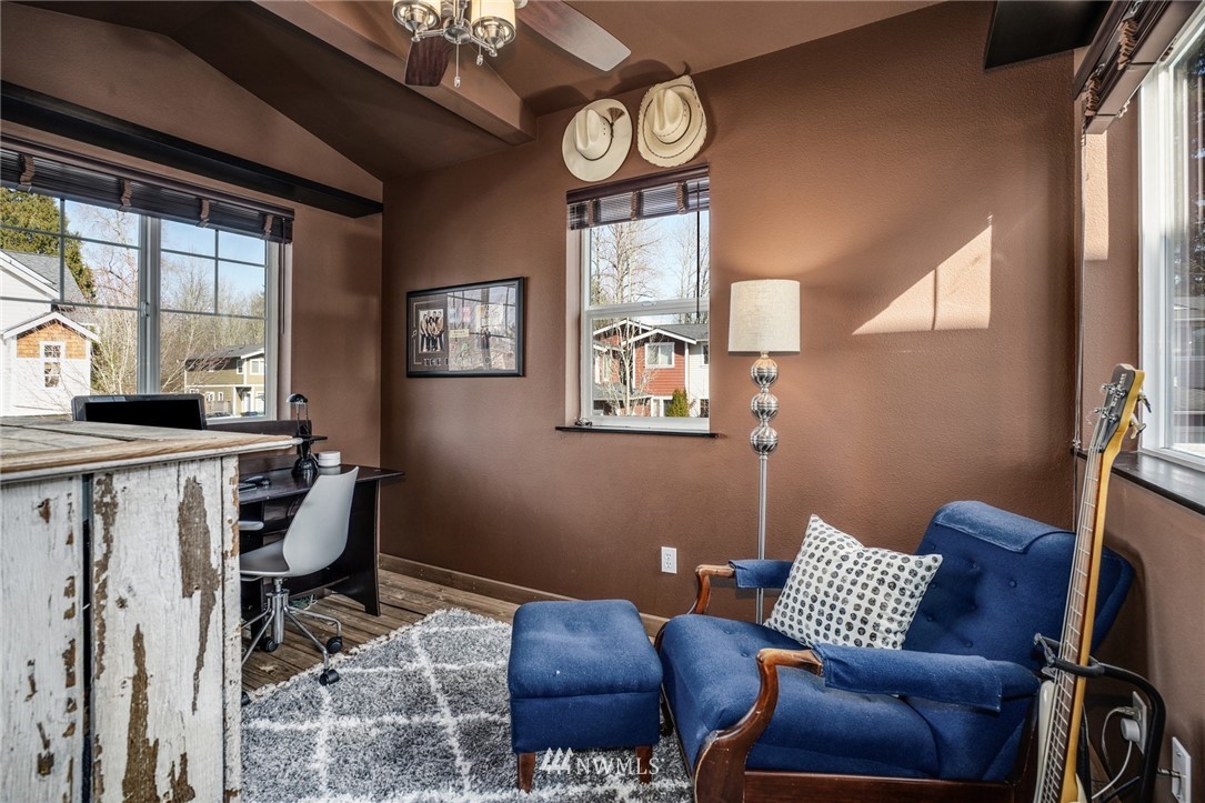 11417 Southeast 171st Street Renton, WA 98055 - Photo 20 of 27 a living room with furniture and a window