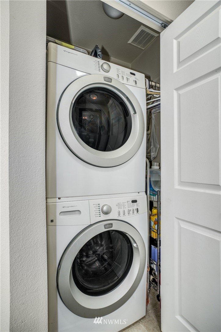 11417 Southeast 171st Street Renton, WA 98055 - Photo 21 of 27 a utility room with dryer and washer