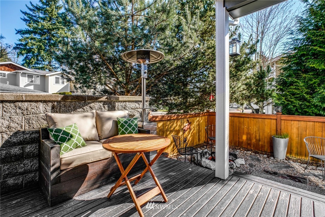 11417 Southeast 171st Street Renton, WA 98055 - Photo 24 of 27 a view of a chairs and table in the balcony