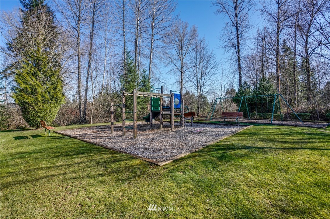 11417 Southeast 171st Street Renton, WA 98055 - Photo 26 of 27 a view of a park with large trees