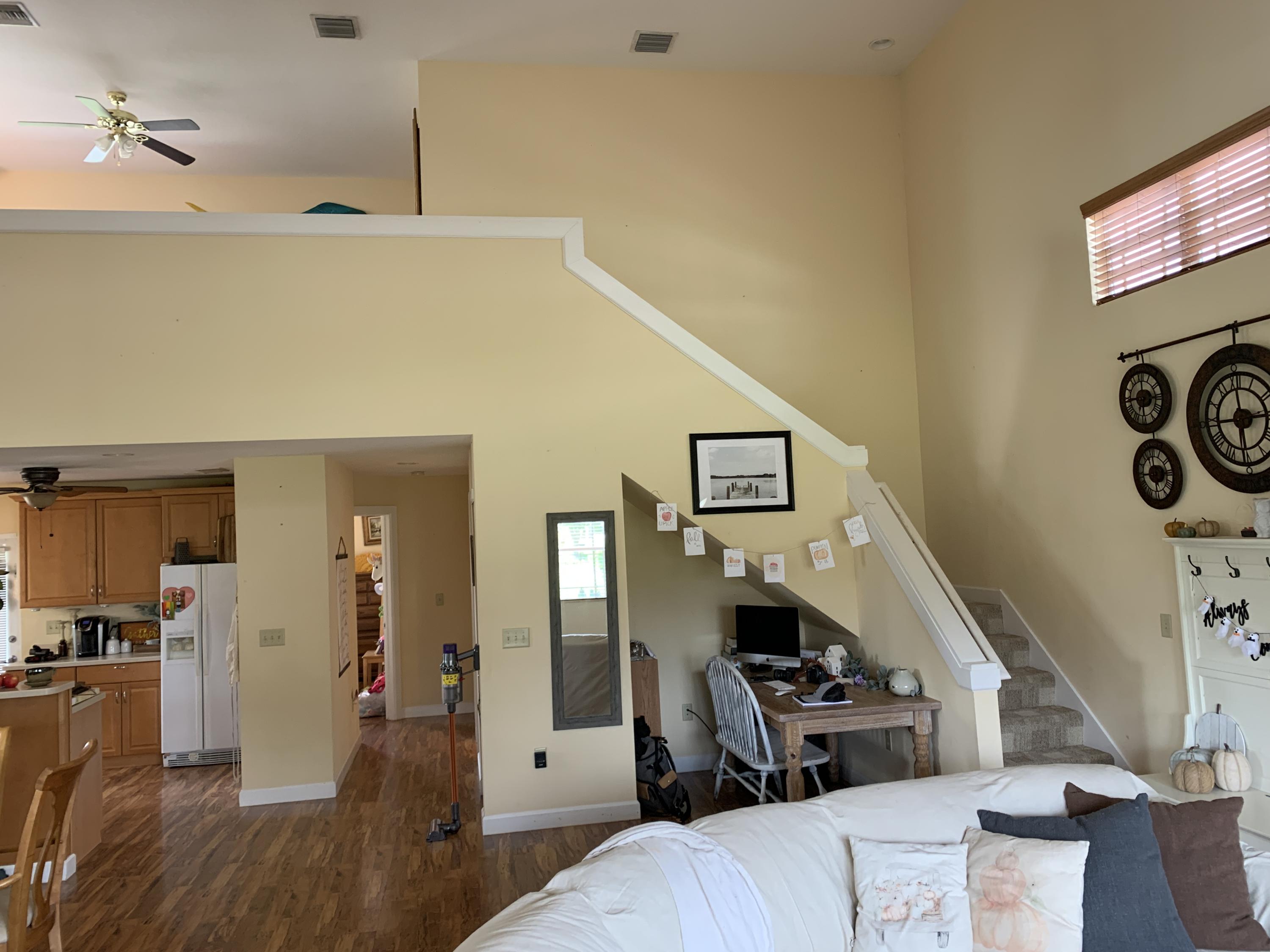 4334 Highway 441, Unit 22 Okeechobee, FL 34974 - Photo 14 of 31 a living room with furniture and a wooden floor