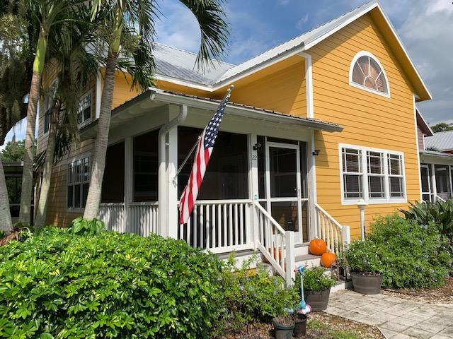 4334 Highway 441, Unit 22 Okeechobee, FL 34974 - Photo 3 of 31 a front view of a house with a yard