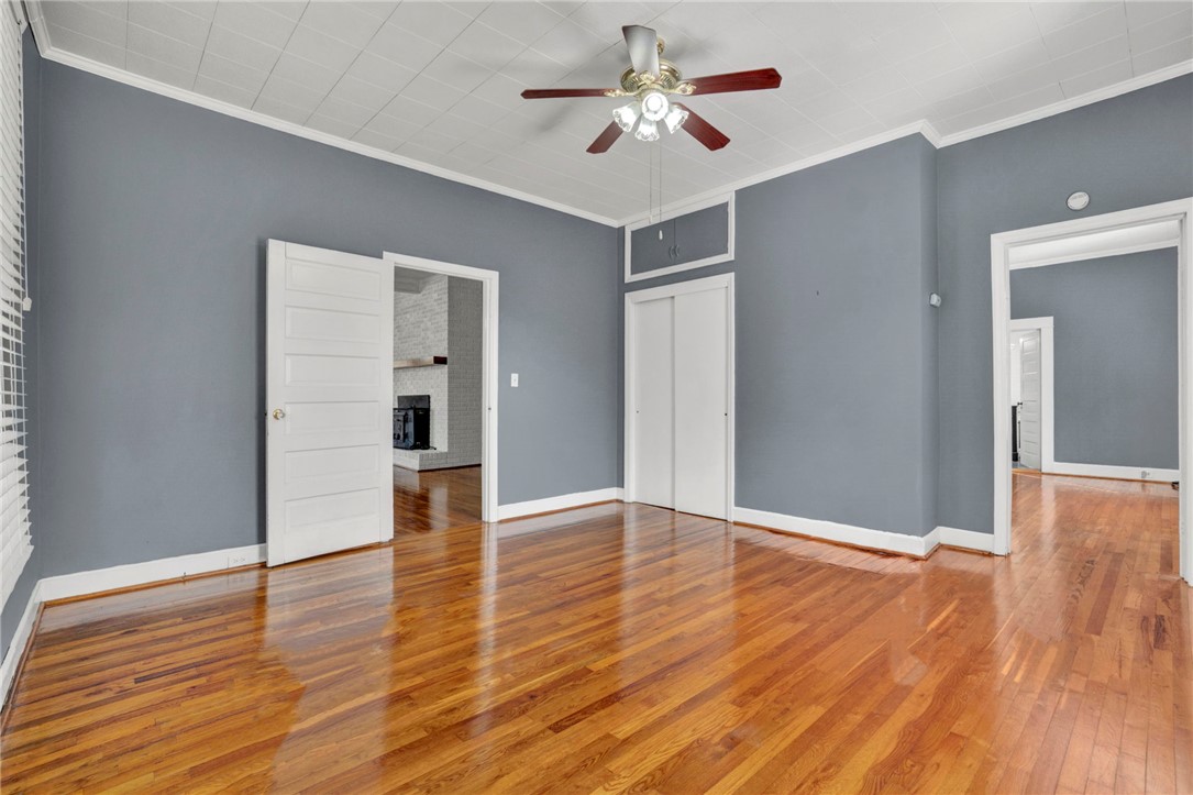 302 Gassaway Street Central, SC 29630 - Photo 16 of 34 This inviting front bedroom features warm wood flooring.