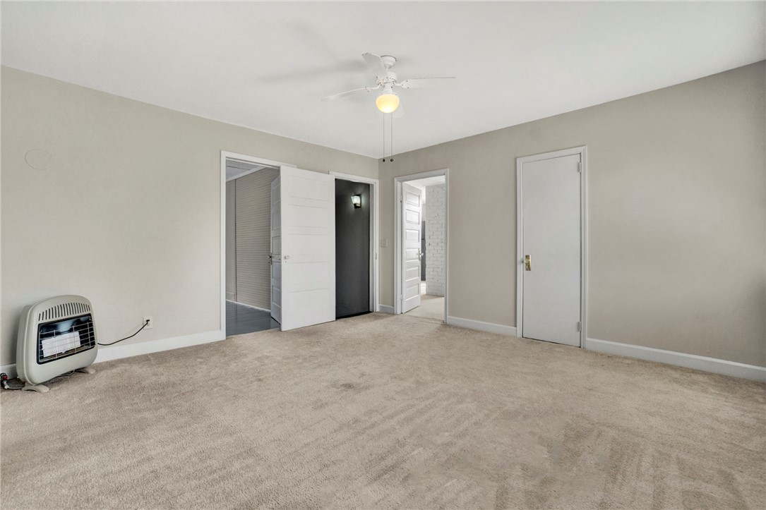 302 Gassaway Street Central, SC 29630 - Photo 18 of 34 This spacious area offers ample natural light and a comfortable atmosphere for rest and rejuvenation.