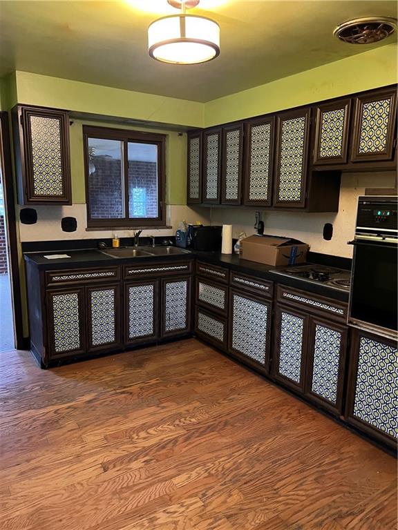 2037 McKees Rocks Road McKees Rocks, PA 15136 - Photo 3 of 19 a kitchen with stainless steel appliances granite countertop a stove and a sink