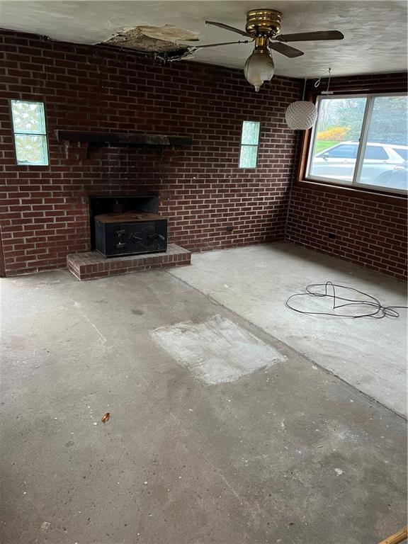 2037 McKees Rocks Road McKees Rocks, PA 15136 - Photo 5 of 19 a view of an empty room with a fireplace