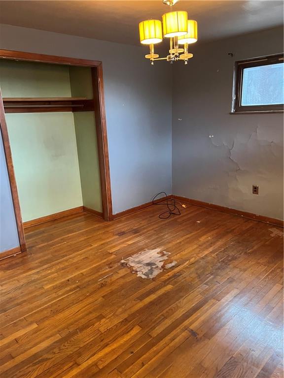2037 McKees Rocks Road McKees Rocks, PA 15136 - Photo 9 of 19 an empty room with wooden floor and windows