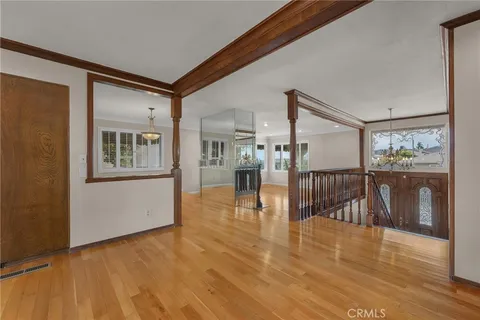 a view of livingroom with furniture and hardwood floor