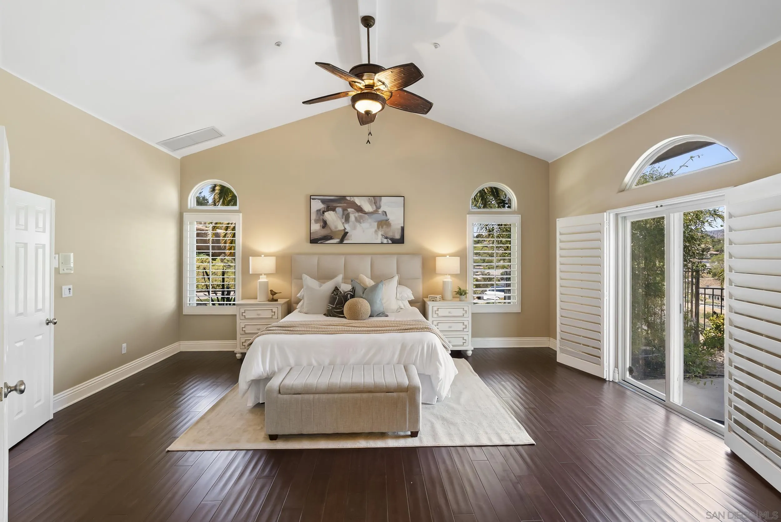 14998 Budwin Lane Poway, CA 92064 - Photo 24 of 44 a bedroom with a large bed and a window