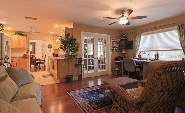 a living room with furniture and a window