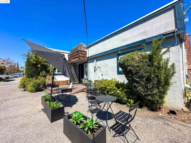 a front view of a house with patio