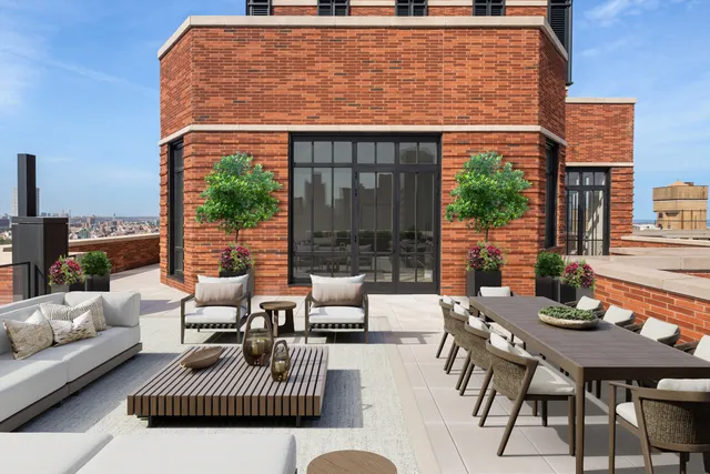 a outdoor living space with furniture and a fireplace