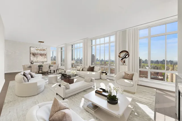 a view of a dining room with furniture wooden floor and chandelier
