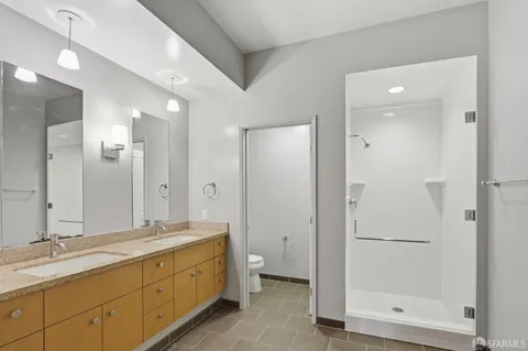 a bathroom with a toilet and a sink