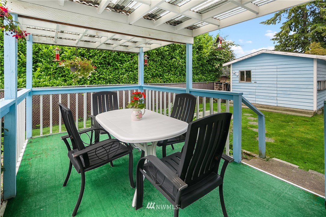 859 Monroe Avenue Northeast Renton, WA 98056 - Photo 22 of 23 a view of a two chairs in the patio
