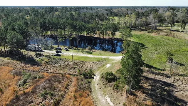 a view of swimming pool with a yard